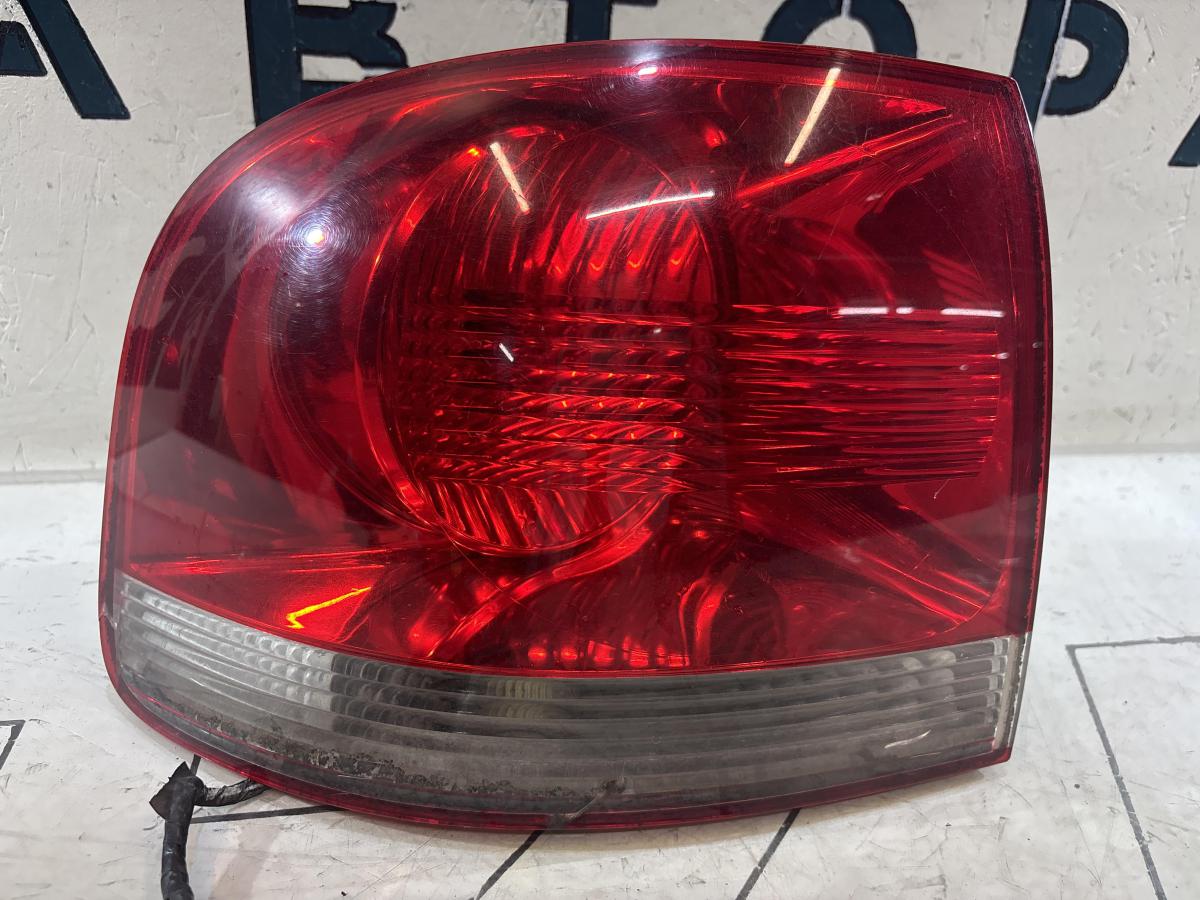 Фонарь левый 7L6945095K Volkswagen Touareg I