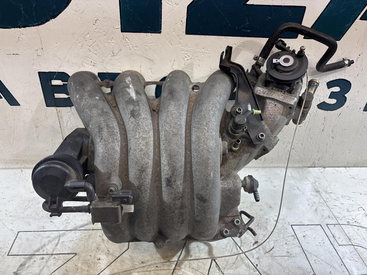 Коллектор впускной 058133213 