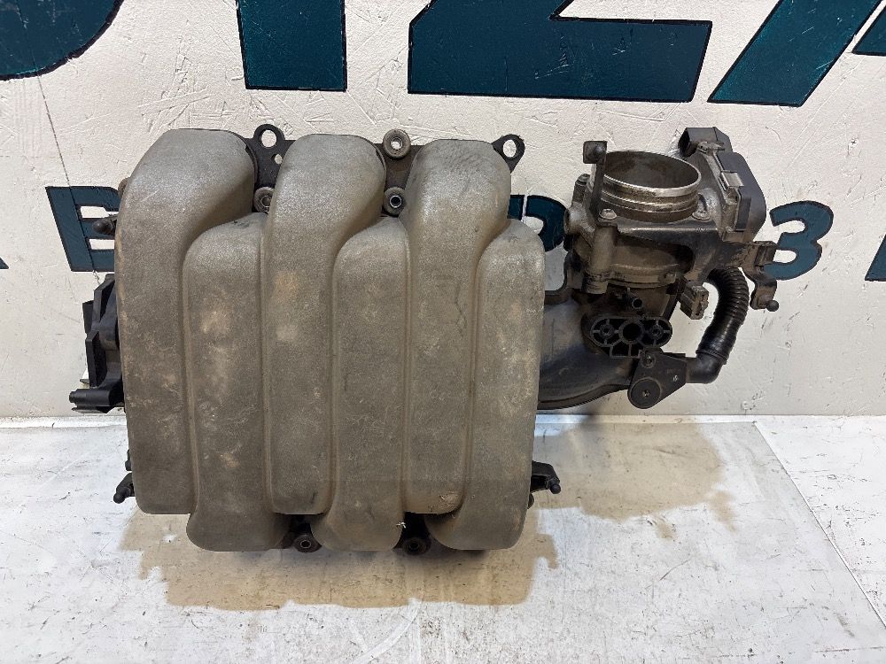 Коллектор впускной 06E133210G 