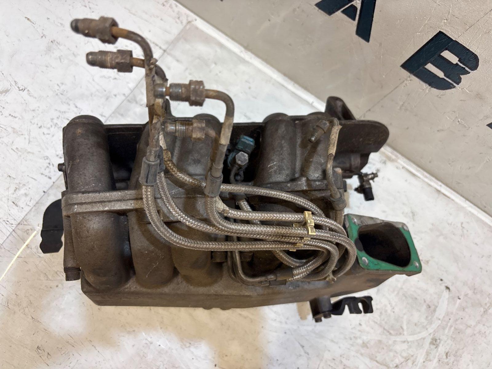 Коллектор впускной 034133223D 